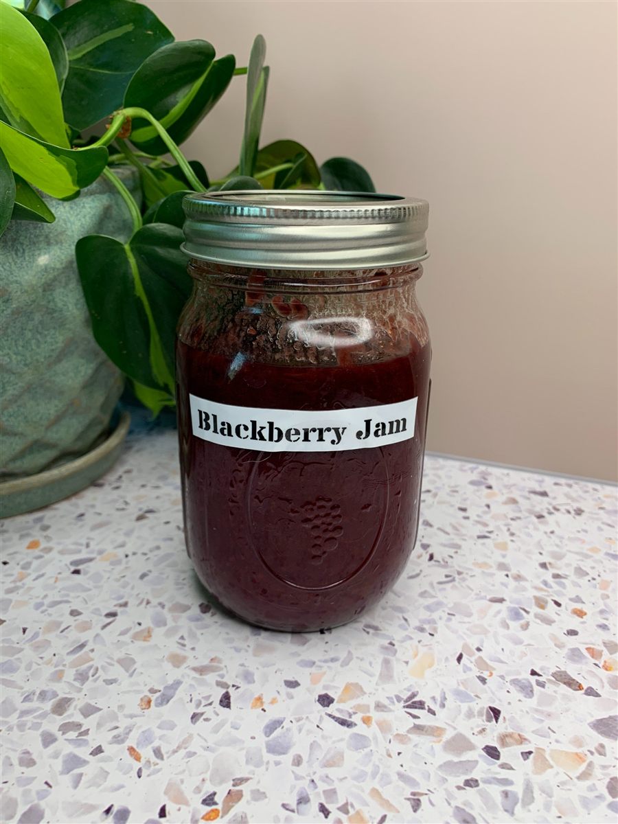 Jars of homemade blackberry jam.