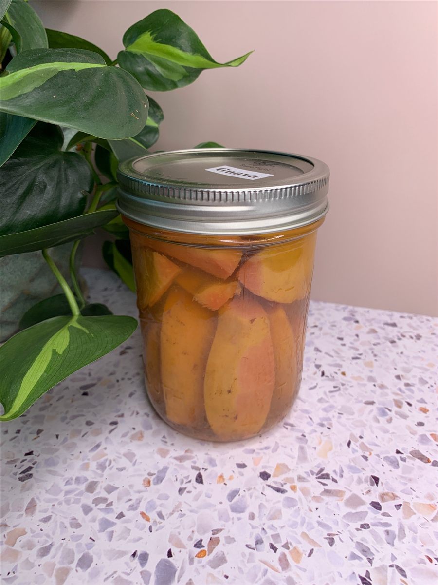 A jar of canned pink guava.